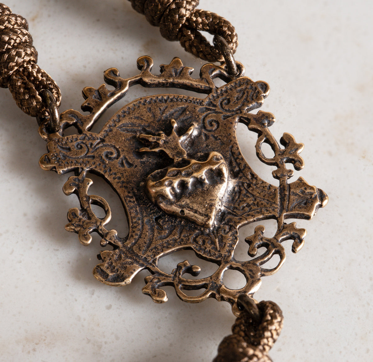 Solid bronze Sacred Heart centerpiece on the Fountain of Life rosary