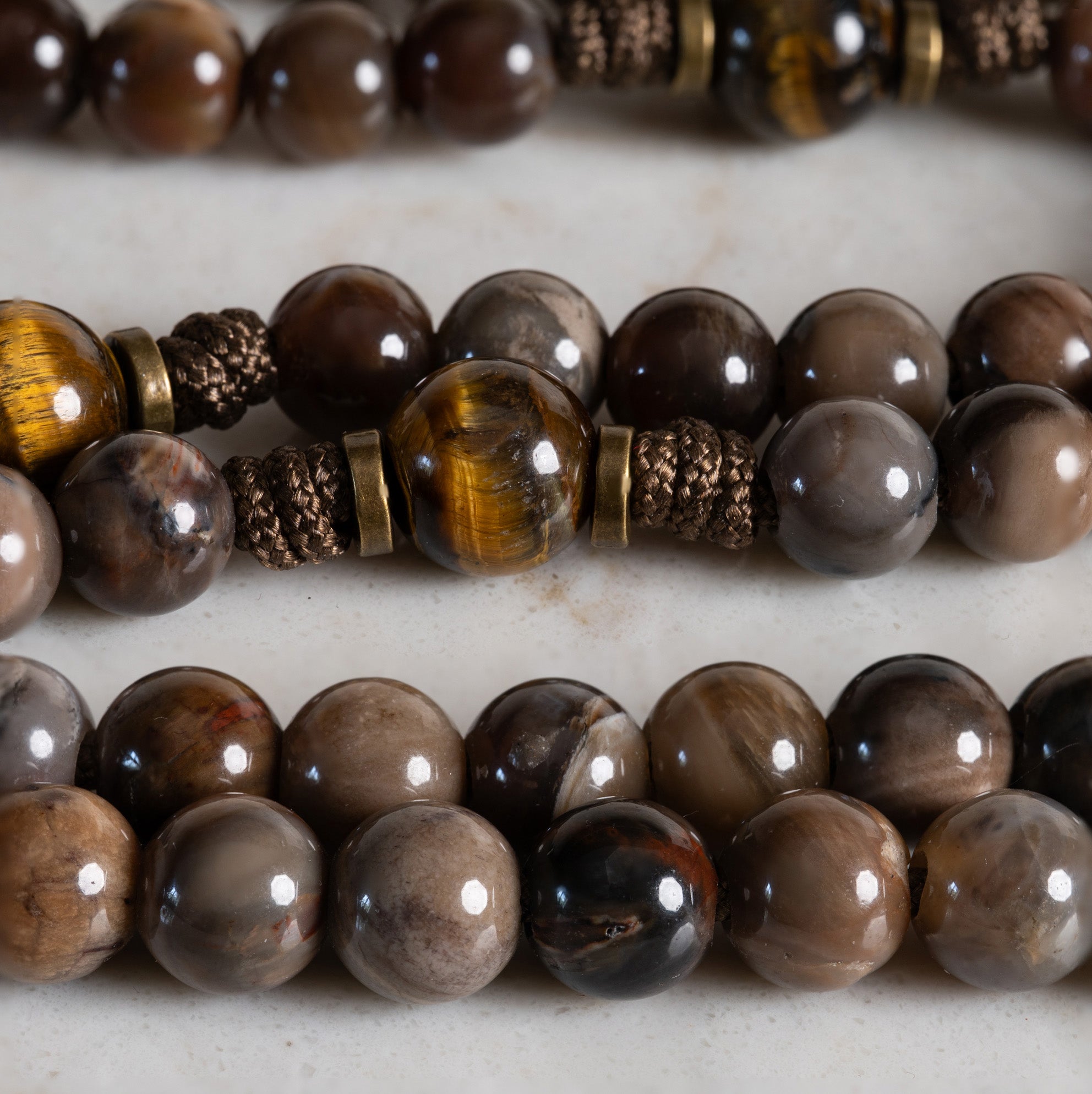 Close-up of Petrified Wood and Tiger’s Eye beads on the Defender of the Faith rosary