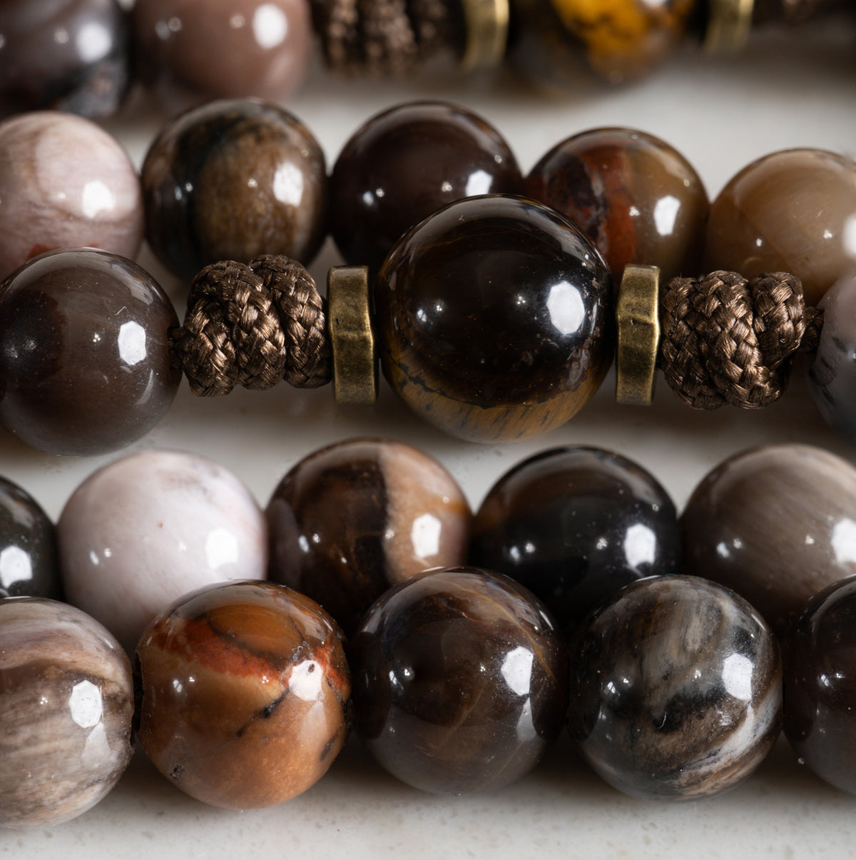Close-up of Petrified Wood and Tiger’s Eye beads on the Defender of the Faith rosary