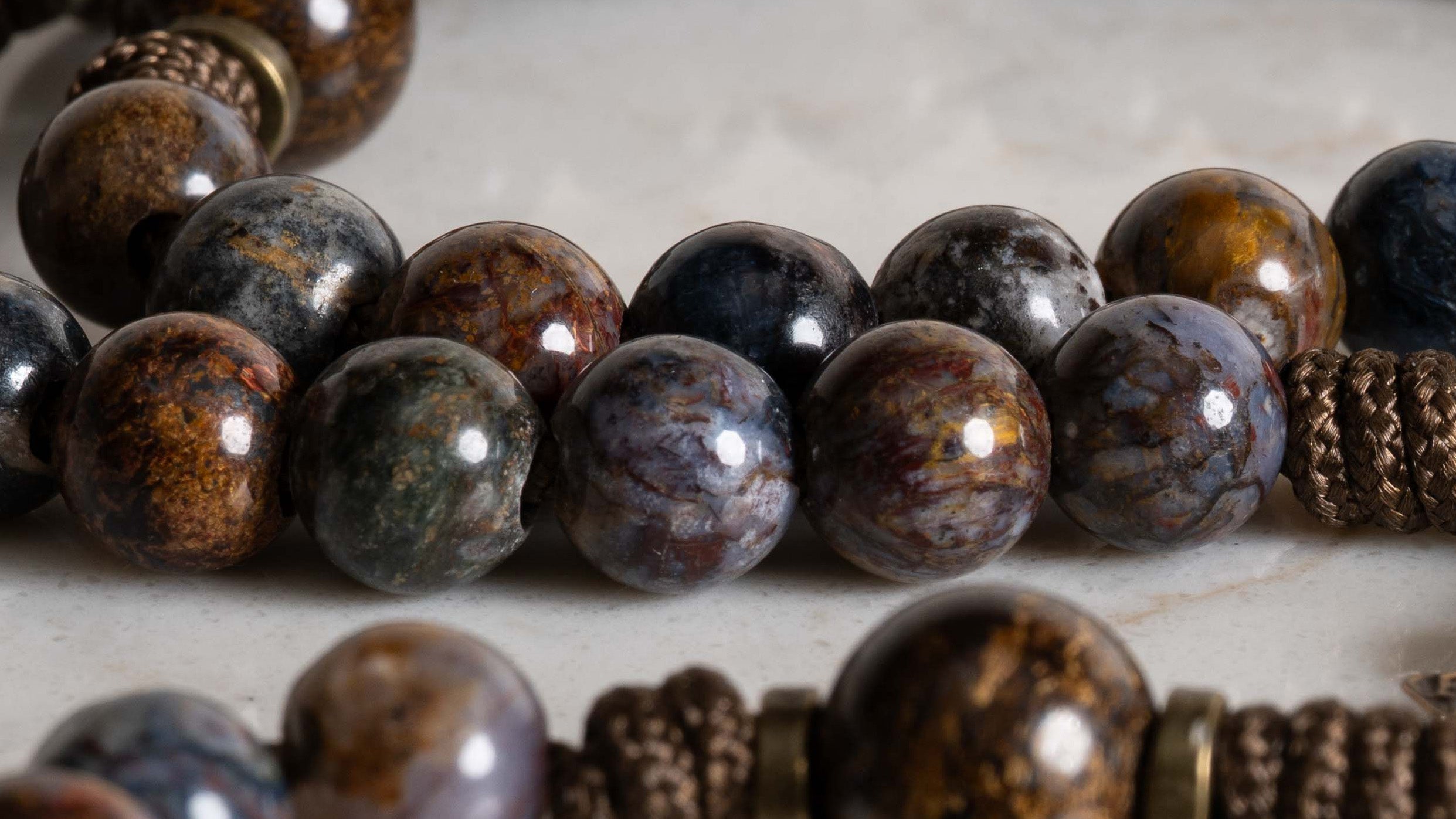 Close-up of Pietersite and Bronzite beads on the Fountain of Life rosary