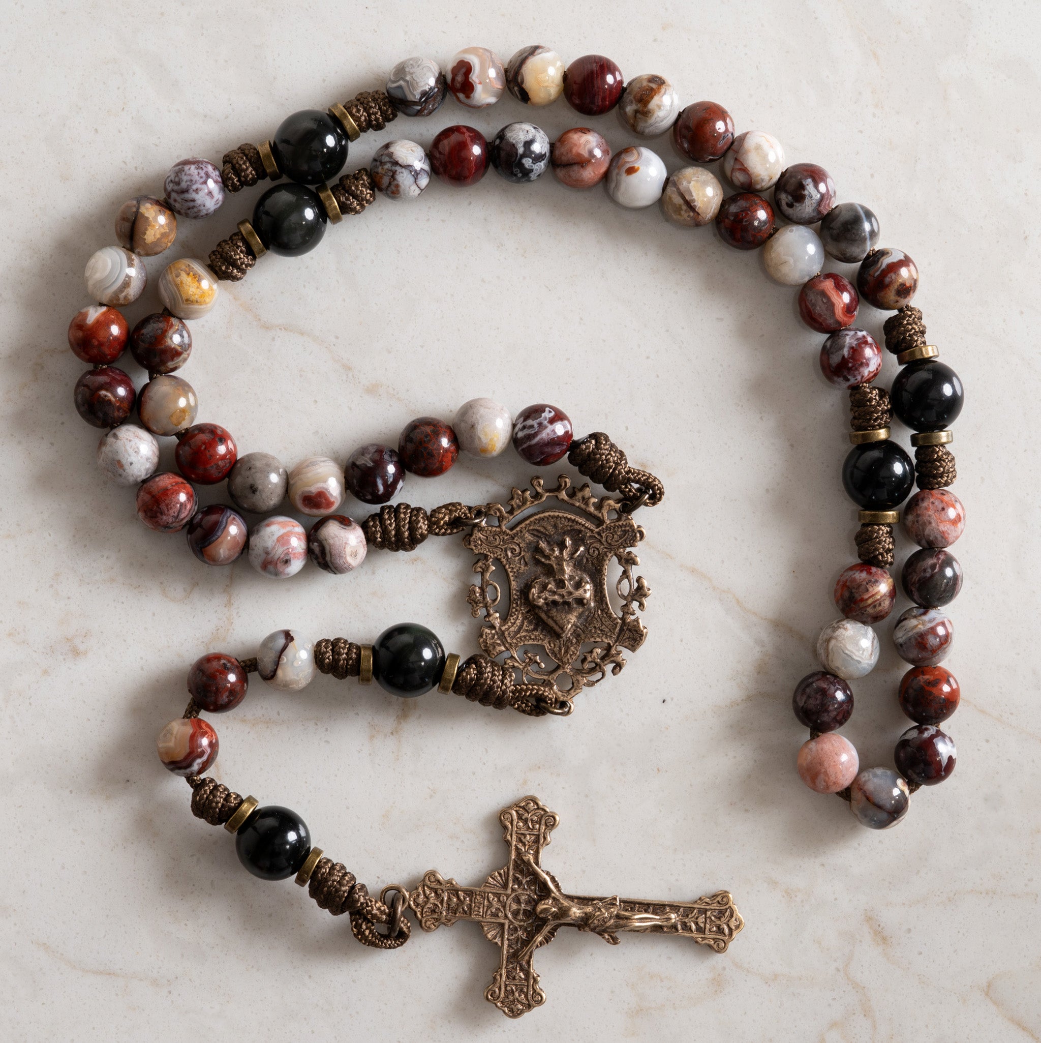 Vessel of Justice rosary made with Crazy Lace Agate, Rainbow Obsidian, and solid bronze